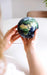 11.5cm Earth With Cloud Magnetic Spinning Globe held