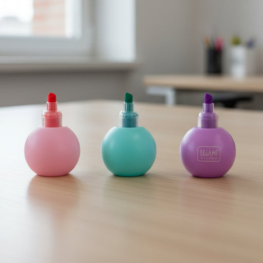 3 in 1 Highlighter Unicorn shaped toy with a pink and blue design in a clear packaging box on a desk