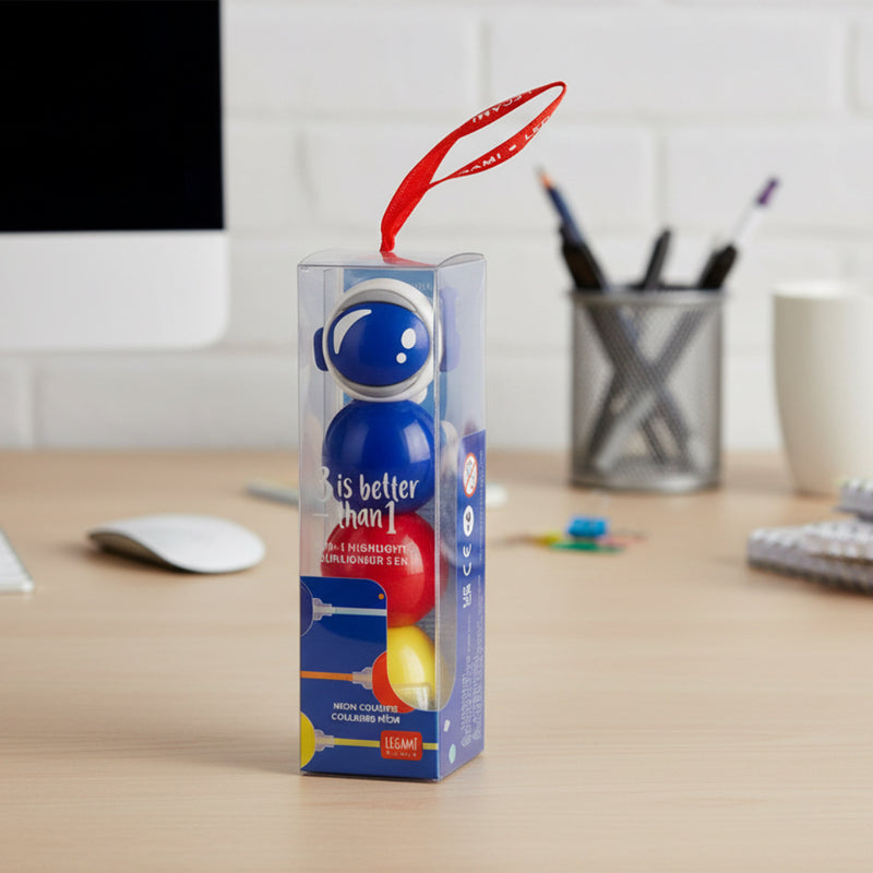 3-in-1 Highlighter Packaged product with colorful balls on a desk