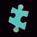 A single jigsaw puzzle piece with a holographic, iridescent light blue finish, held between two fingers against a solid black background.