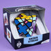 Skewb Xtreme puzzle toy in open packaging on a purple background