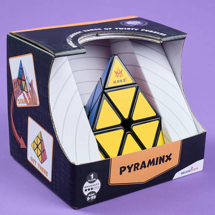 Pyraminx puzzle in open packaging on a purple background