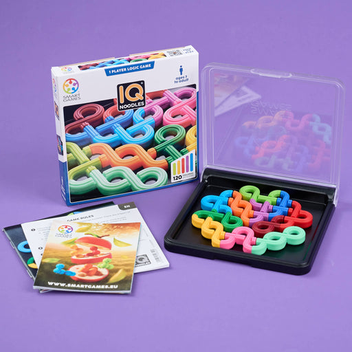 IQ Noodles game set with colorful links and packaging on a purple background