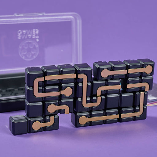 Fidget spinner with circuit board design on a purple background