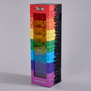 A tall rectangular display box for the CMY Cubes toy set, featuring a rainbow-colored stack of translucent cube-shaped compartments on the front, with a black side panel and the words "CMY Cubes" and 'Newton's Tower' visible.