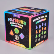 A boxed product called Polysquish Discovery Series by Cubes, shown at a three-quarter angle on a light gray studio background. The box is black with bright neon rainbow borders and colorful geometric illustrations, including a triangle, hexagon, square, and diamond.