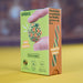 Speks Mashable Earth Magneets product box, featuring a bright lime green and orange design with a demonstration of hands holding a small, colorful, spherical magnet.