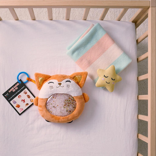 Sensory Seeker Fifi Fox on baby bed