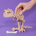 Carontaurus bones skeleton professor plums with hand on a purple background