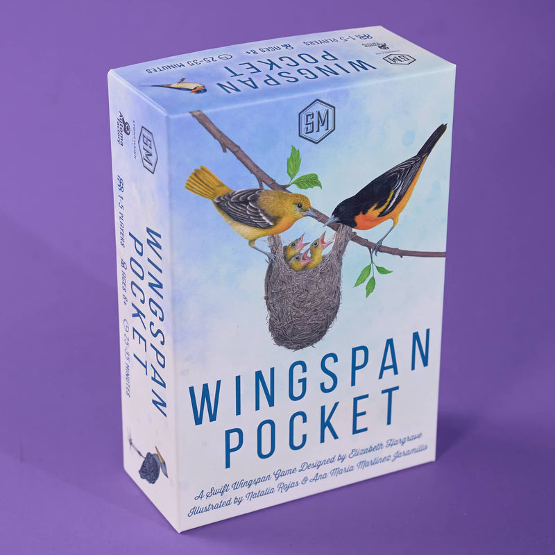 The product is a boxed card game called Wingspan Pocket, shown standing upright on a solid purple background. The box features an illustration of birds and a nest on a light blue sky background, with the title 'WINGSSPAN POCKET' in large blue letters.