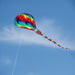 Colorful kite flying against a clear blue sky