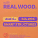 Promotional graphic on an orange background with purple and yellow text reading 'with REAL WOOD.', 'AGE 6+', '60+ PCS', and 'SMART STRUCTURES', plus a choking-hazard warning icon and age 0-3 mark.