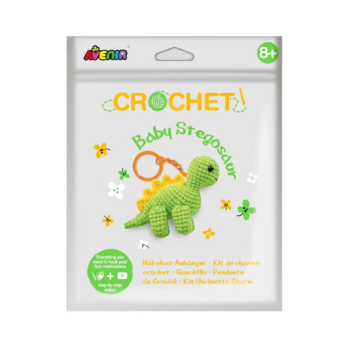 Crochet baby stegosaurus keychain kit packaging by Avenir on a white background