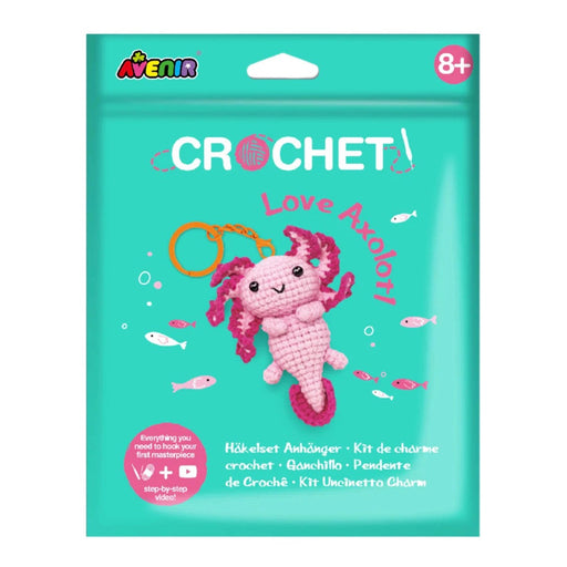 Crochet kit packaging with a pink axolotl charm on a teal background