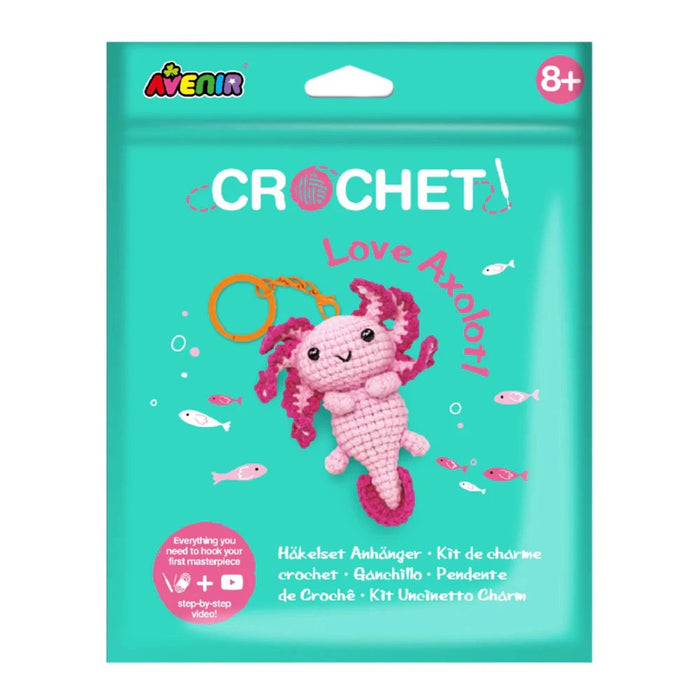 Crochet kit packaging with a pink axolotl charm on a teal background