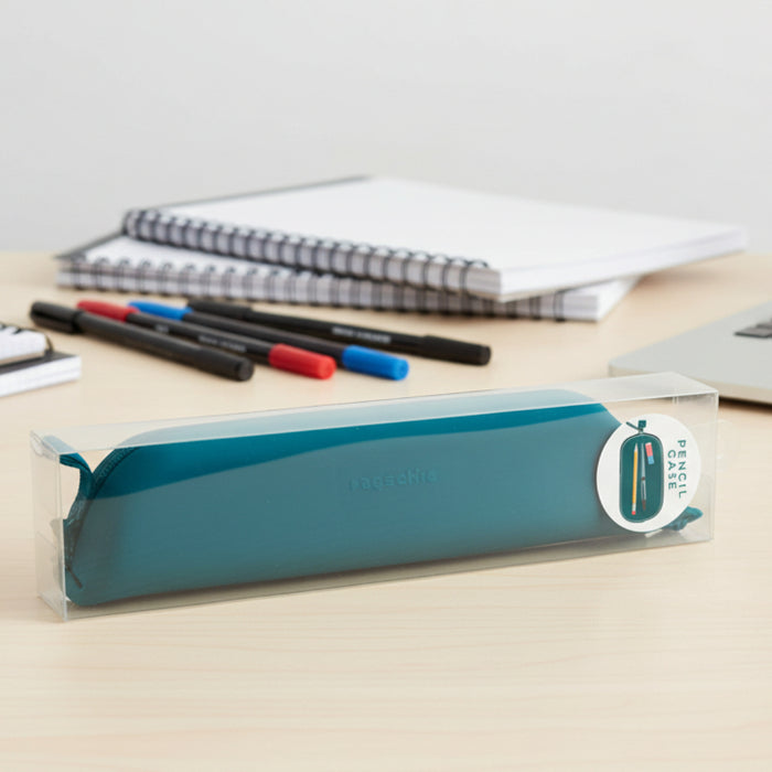 Teal pencil case in a clear packaging box on a white background