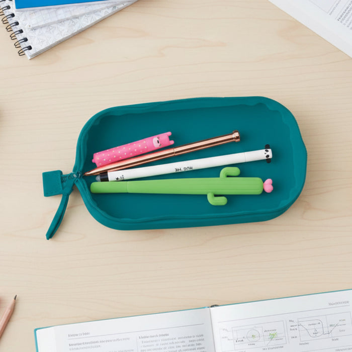 Teal pencil case with colorful pens on a wooden surface