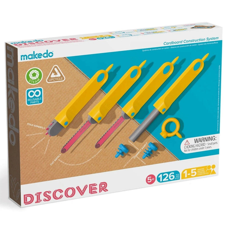 Makedo cardboard construction system packaging with yellow tools on a white background