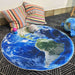 Round Earth rug in room