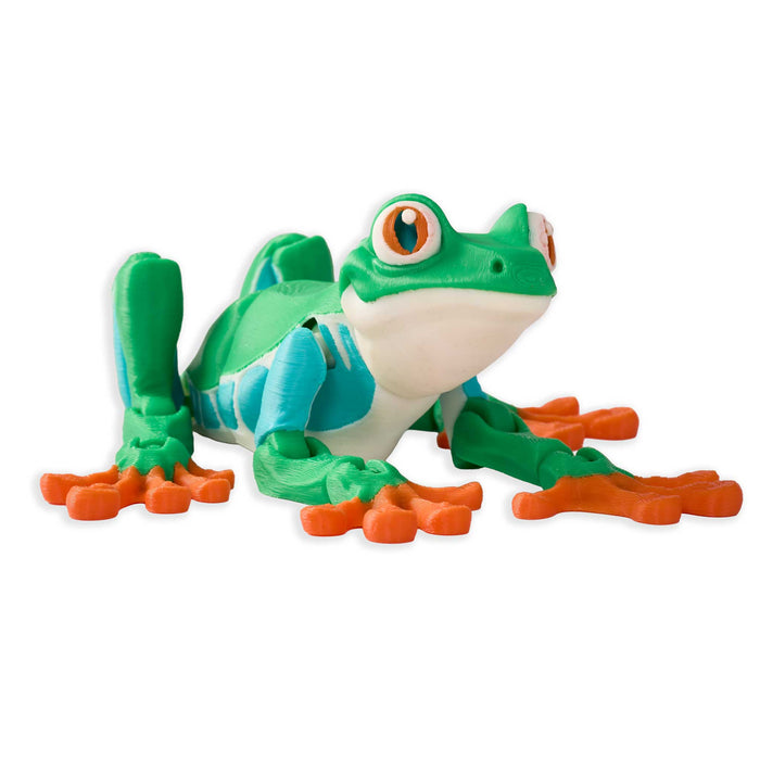 Plush toy frog with green body, orange feet, and blue accents on a white background