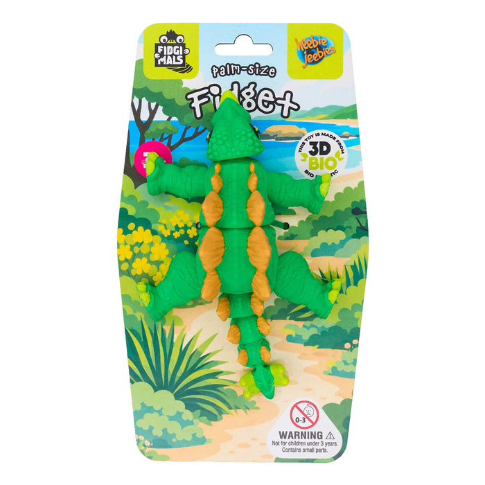 Toy alligator in packaging with a colorful background