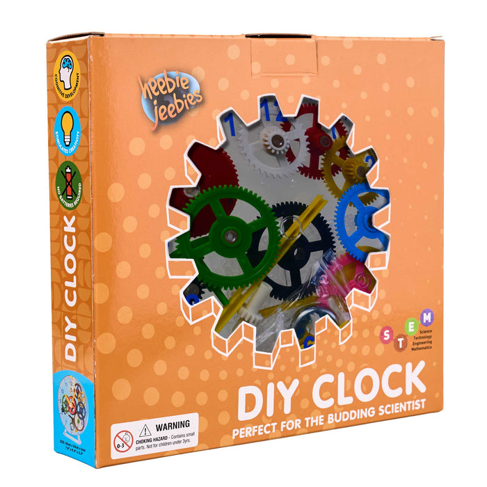 Box of a DIY clock kit with colorful gears on an orange background from heebie jeebies