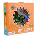 Box of a DIY clock kit with colorful gears on an orange background from heebie jeebies