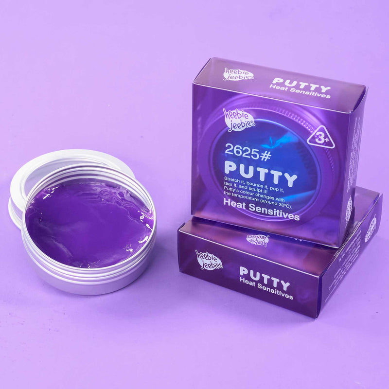 Purple putty with packaging on a purple background
