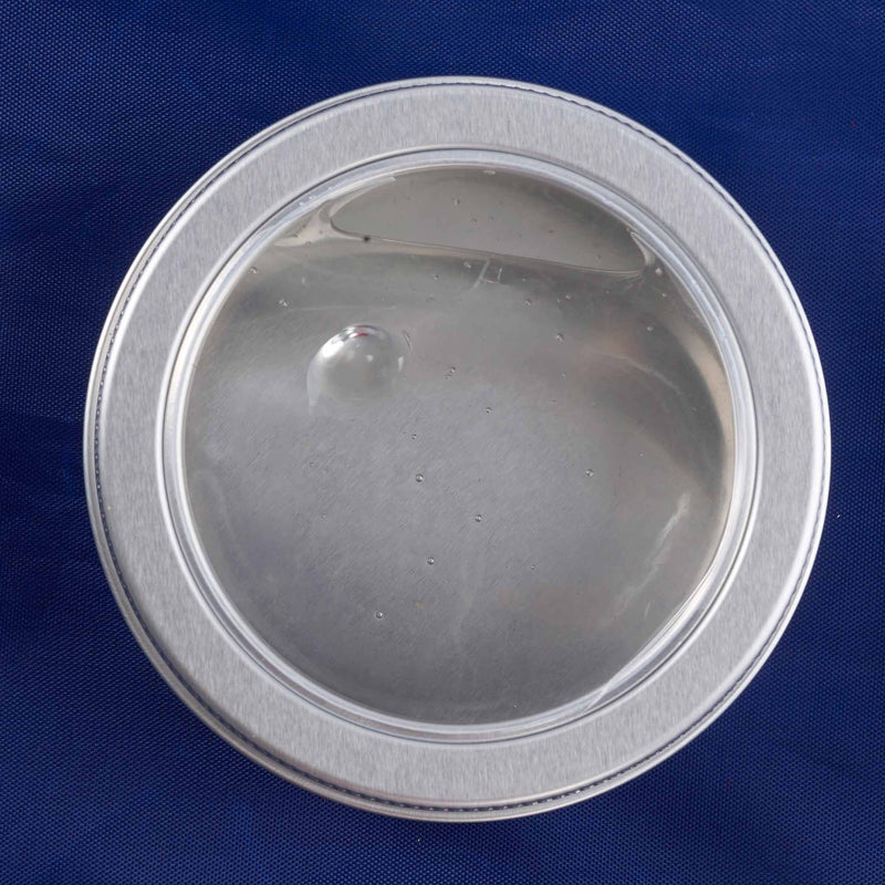 clear putty on a  blue fabric background