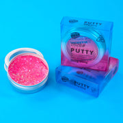 Pink putty with packaging on a blue background