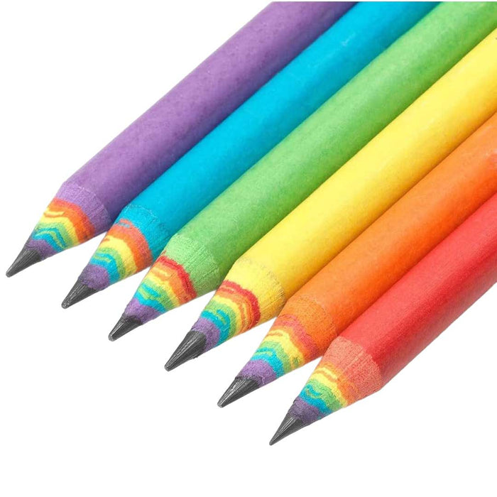 Set of colorful pens with rainbow-tipped caps on a white background