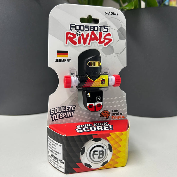  GERMANY Fingerboard toy with packaging labeled 'Foosbots Rivals' on a gray background