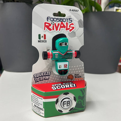 MEXICO Toy package labeled 'Foodsbots Rivals' with a green toy figure on a white surface.