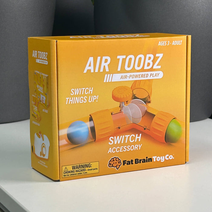 Box of Air Toobz switch accessory by Fat Brain Toy Co on a gray background