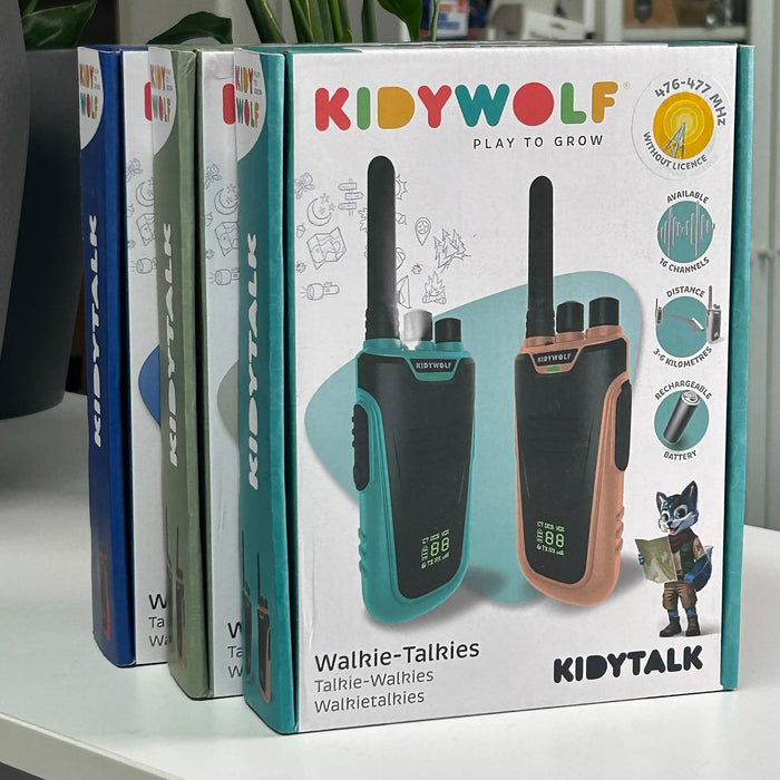 Box of KIDYWOLF walkie-talkies on a white surface with a blurred background