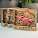 DIY Dino Triceratops Wild Thin Pink dinosaur toy with green weapon in a 'DIY Dinos' box on a light surface.