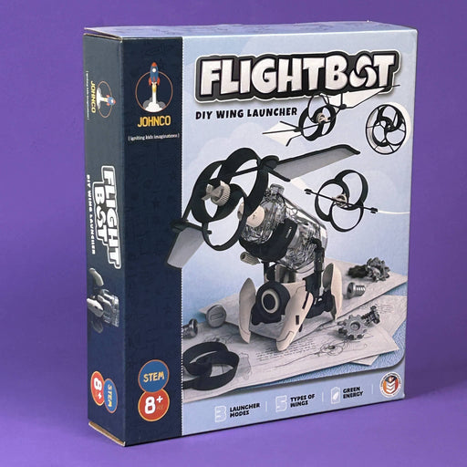 Box of 'FLIGHTBOT' DIY wing launcher toy on a purple background