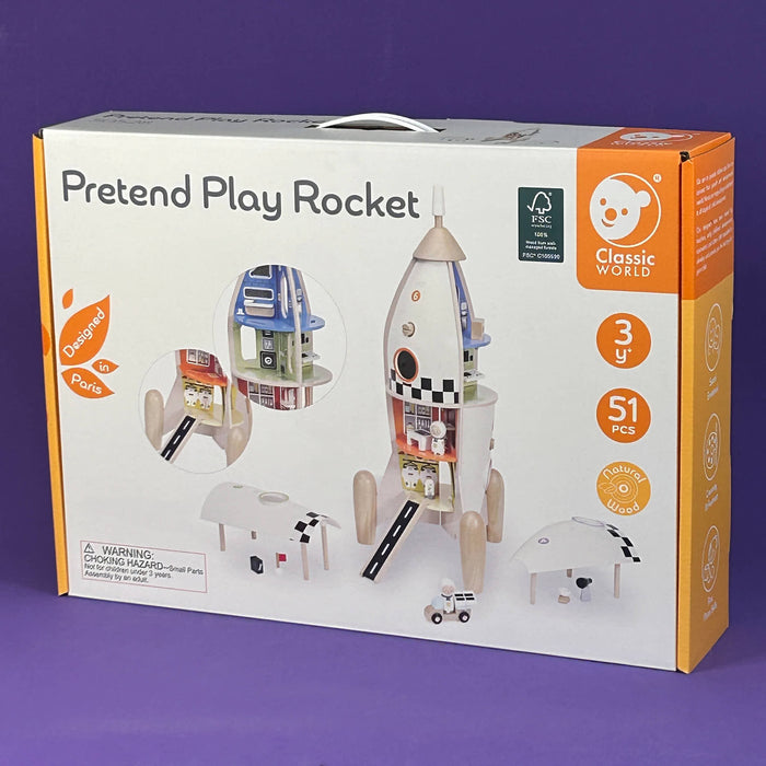 Box of a pretend play rocket set with toy illustrations on a purple background