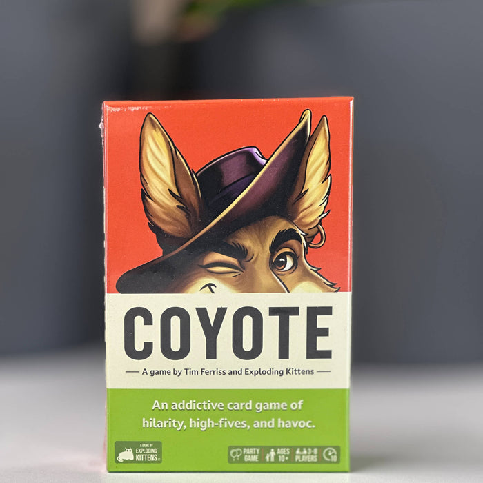 Card game box titled 'Coyote' with a colorful illustration on a gray background