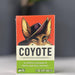 Card game box titled 'Coyote' with a colorful illustration on a gray background