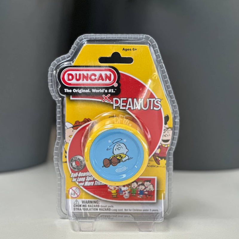 Duncan yoyo packaging featuring Peanuts characters on a gray background