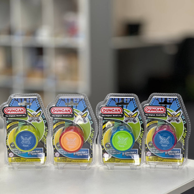 Duncan yoyo yo-yo toys on a shelf with a blurred background