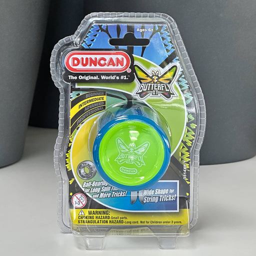 Duncan Butterfly yoyo in clear packaging on a gray background