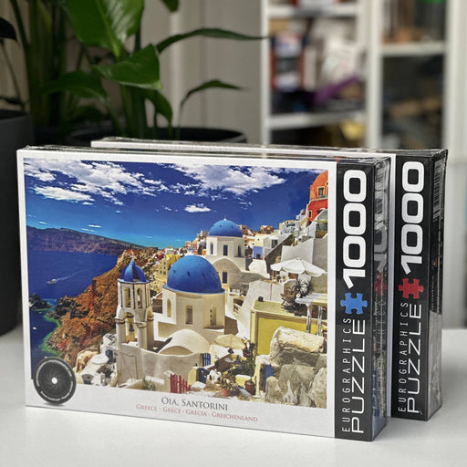 eurographics Puzzle box featuring a scenic view of Santorini with 'Eurographics' branding.