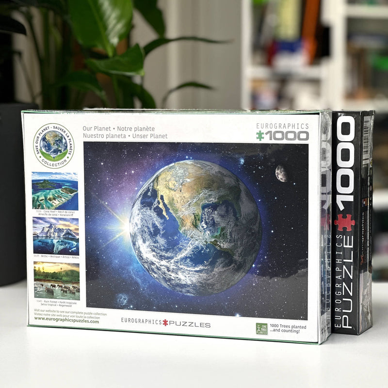 Europressions puzzle box with Earth illustration on a white surface