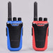 Two kidywolf walkie-talkies shown side by side on a light gray background, one in blue and one in red.