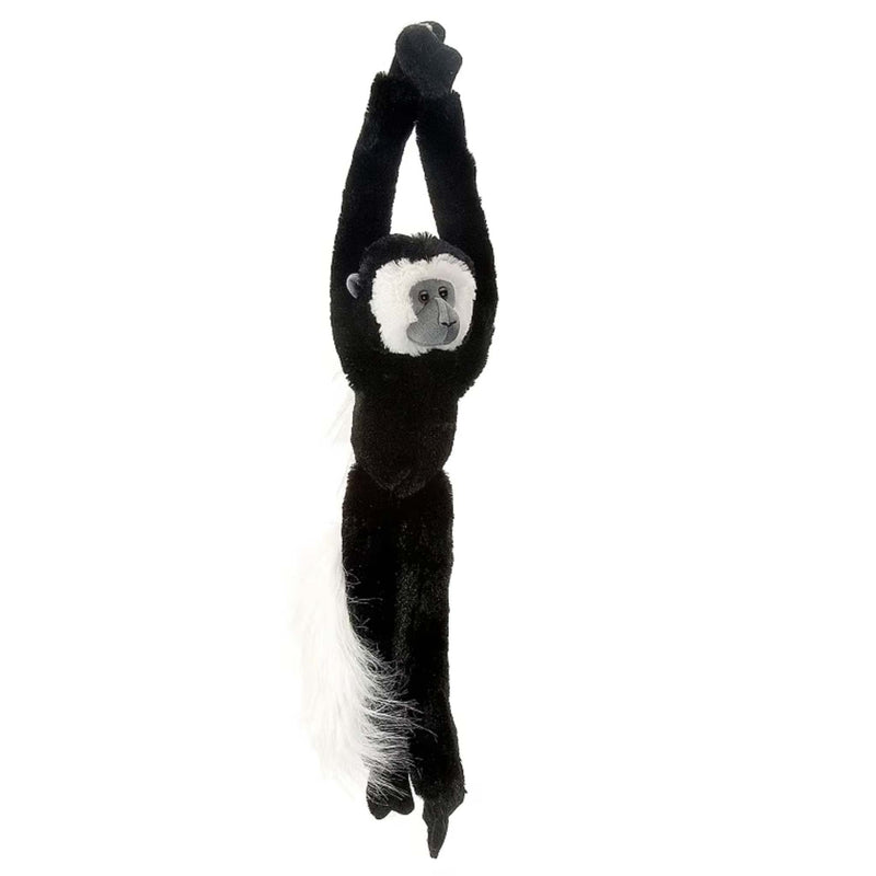 Plush monkey toy hanging on a white background