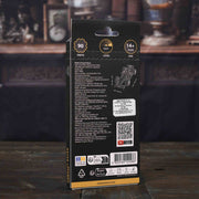 Ugears Compact Racer model Back view of a model kit packaging with text and graphics on a wooden surface.