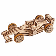 Ugears Compact Racer model Wooden model of a Formula 1 car on a white background