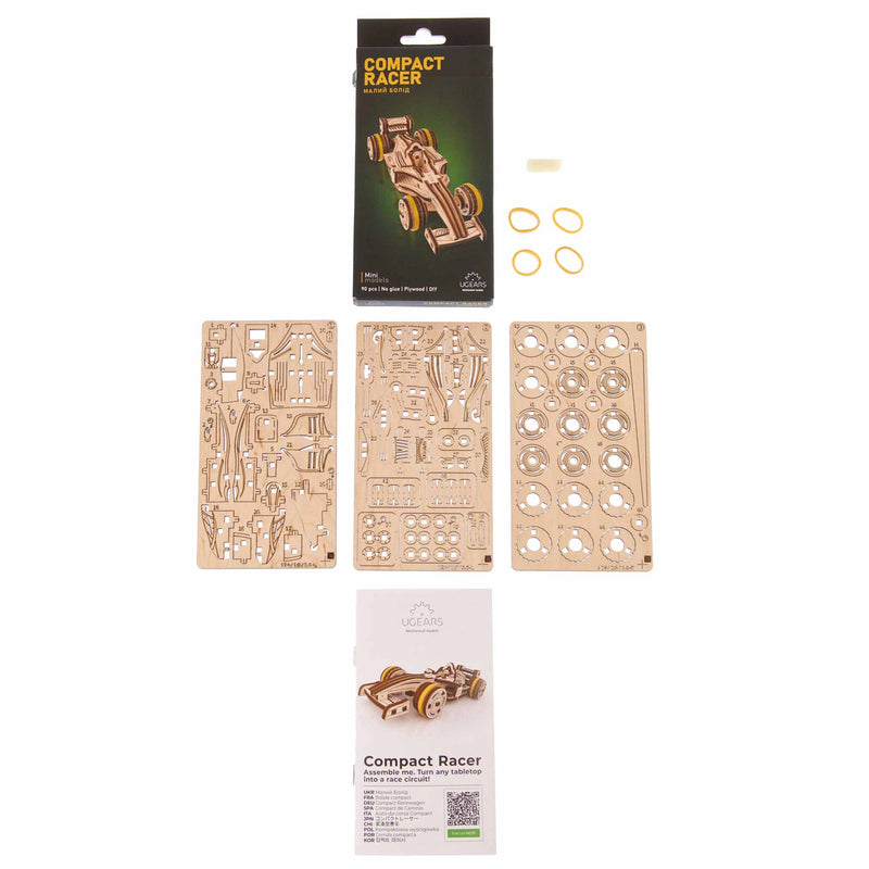 Ugears Compact Racer model Wooden model kit components and packaging for 'Compact Racer' on a white background